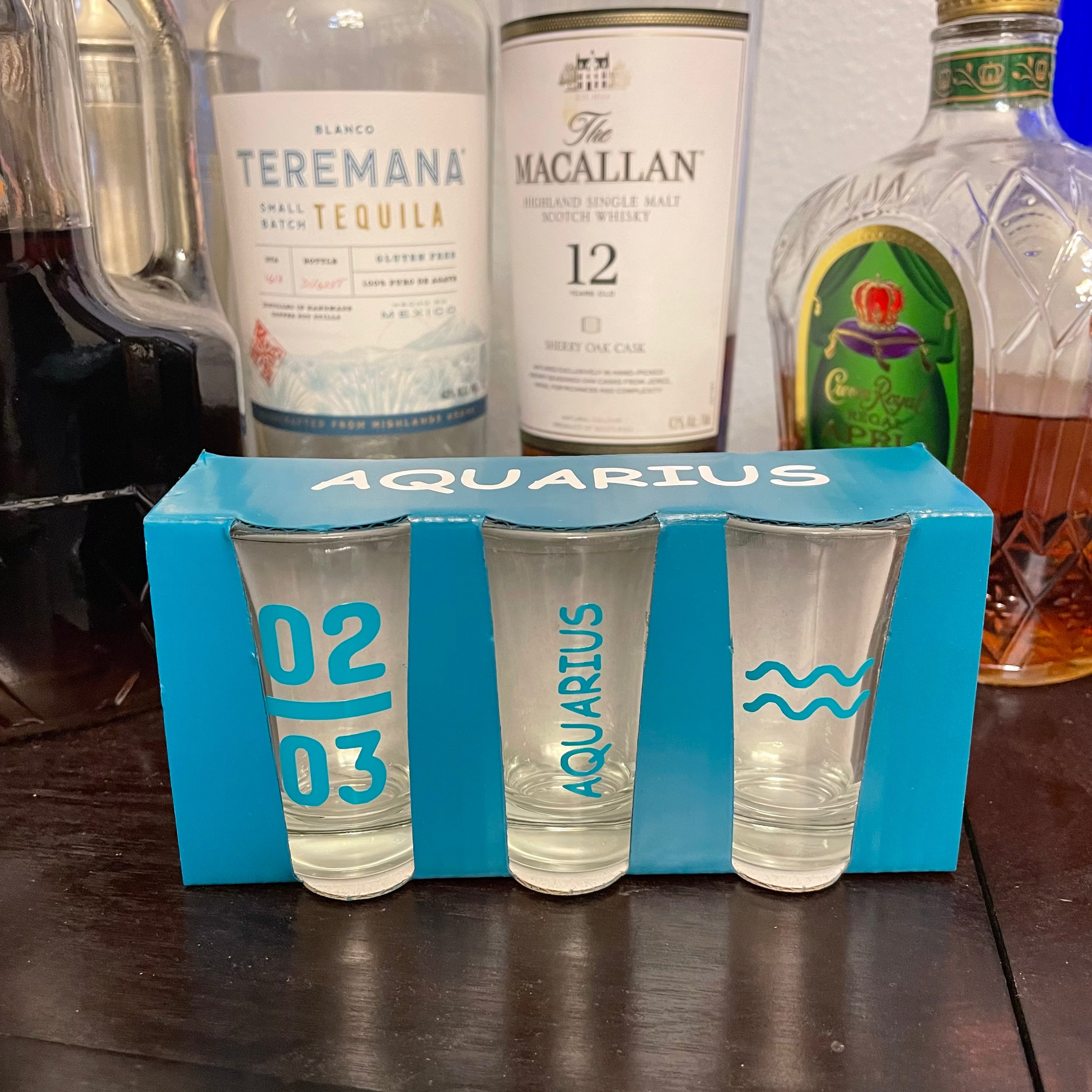 Aquarius zodiac symbol engraved on personalized shot glass