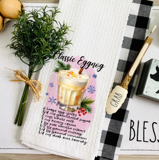 Holiday bar cart styled with Christmas cocktail towel and festive drinkware