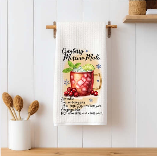 Cranberry Moscow Mule Christmas cocktail towel styled on holiday bar setup