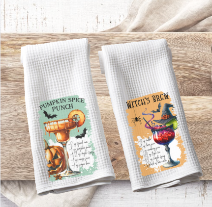 Halloween kitchen hand towel displayed with fall decorations