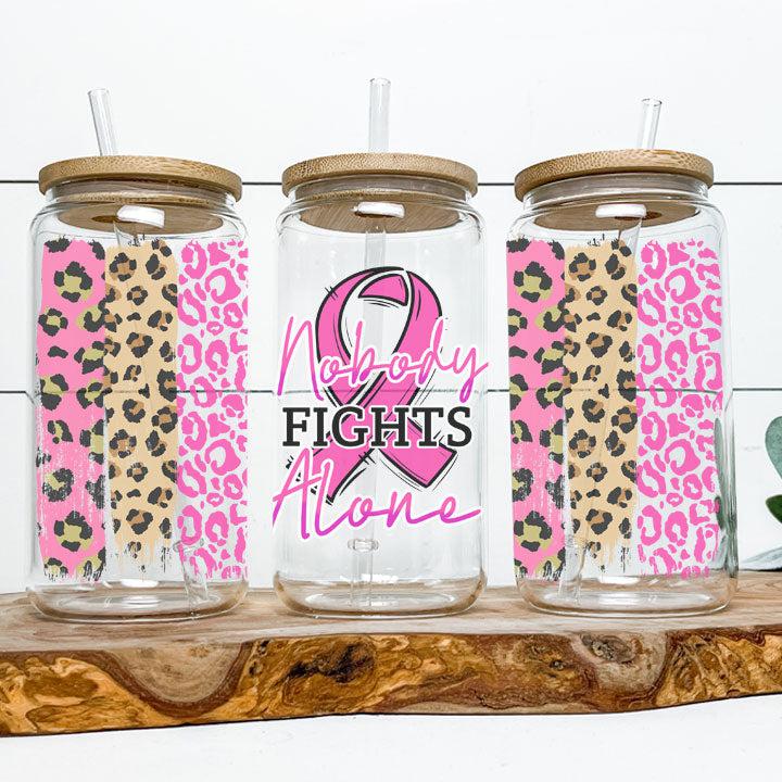 Tumbler featuring “No One Fights Alone” phrase and pink ribbon, perfect gift for friends, family, or caregivers