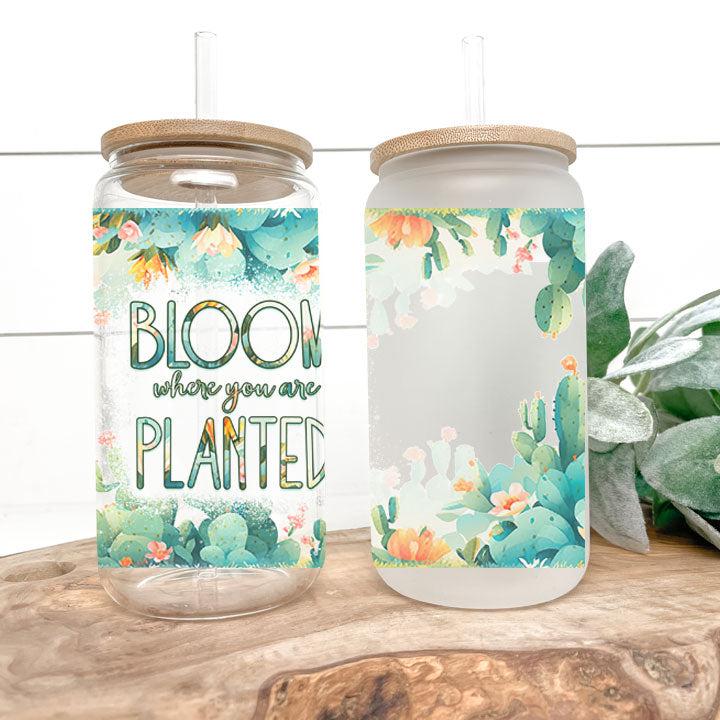 Inspirational tumbler with flower garden artwork and “Bloom Where You Are Planted” phrase, thoughtful gift for friends.