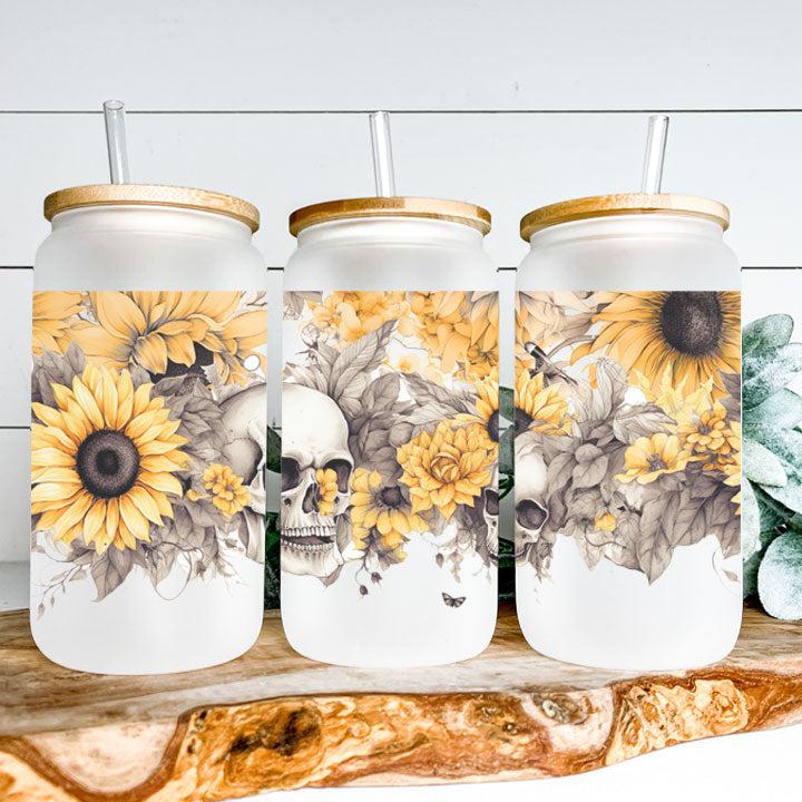 Libby Glass Can Tumbler with skulls in a sunflower garden design, gothic iced coffee cup and Halloween gift idea.