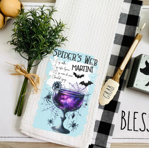 Spider’s Web Martini Halloween cocktail towel styled on bar counter with fall décor