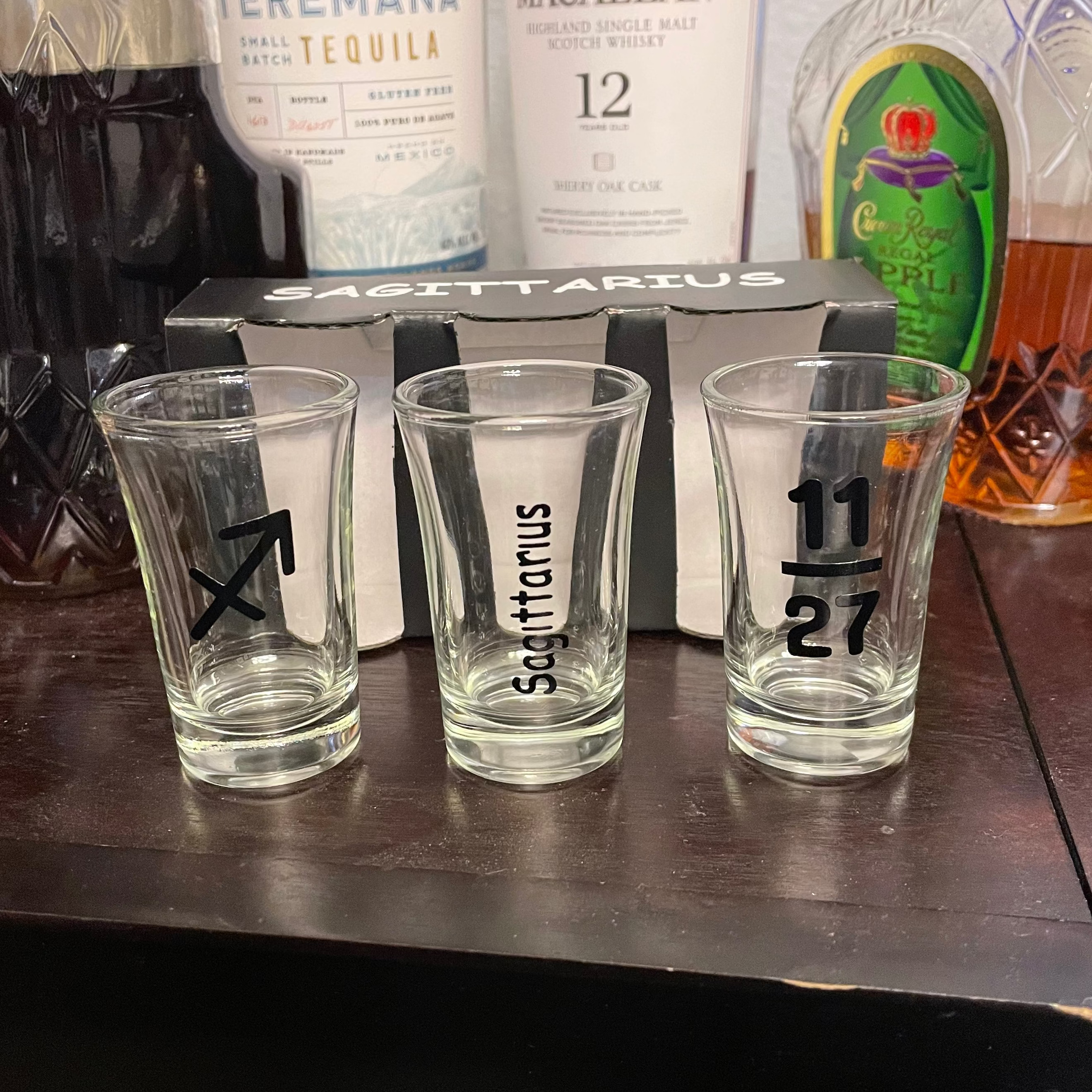 Personalized shot glass featuring engraved zodiac name as a unique birthday gift