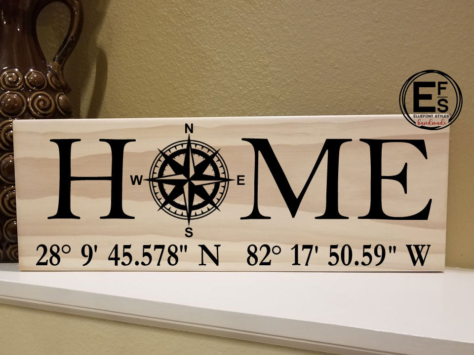 home sign with compass