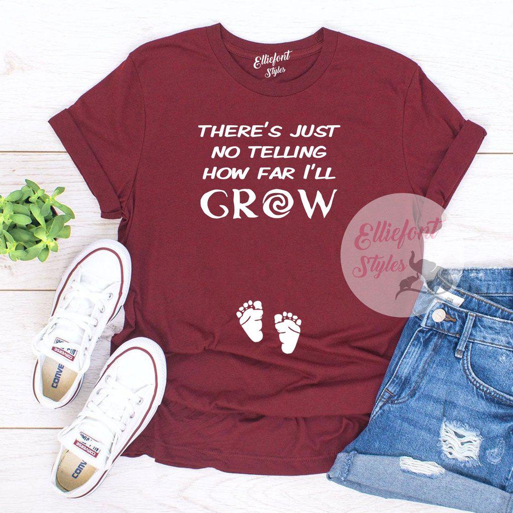 Pregnancy announcement shirt with Disney-inspired phrase and baby footprints