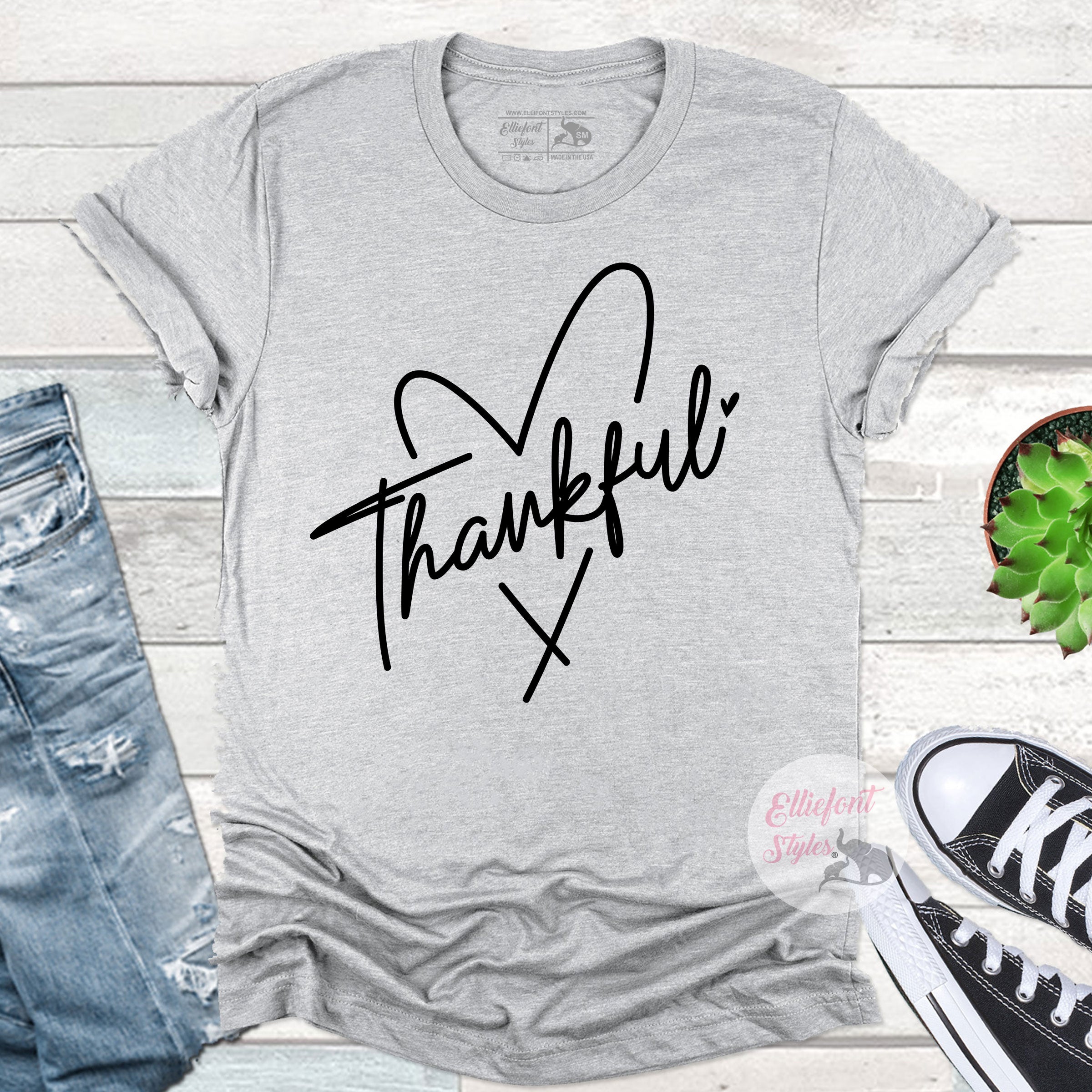 Gratitude themed Thanksgiving shirt with thankful lettering for autumn style