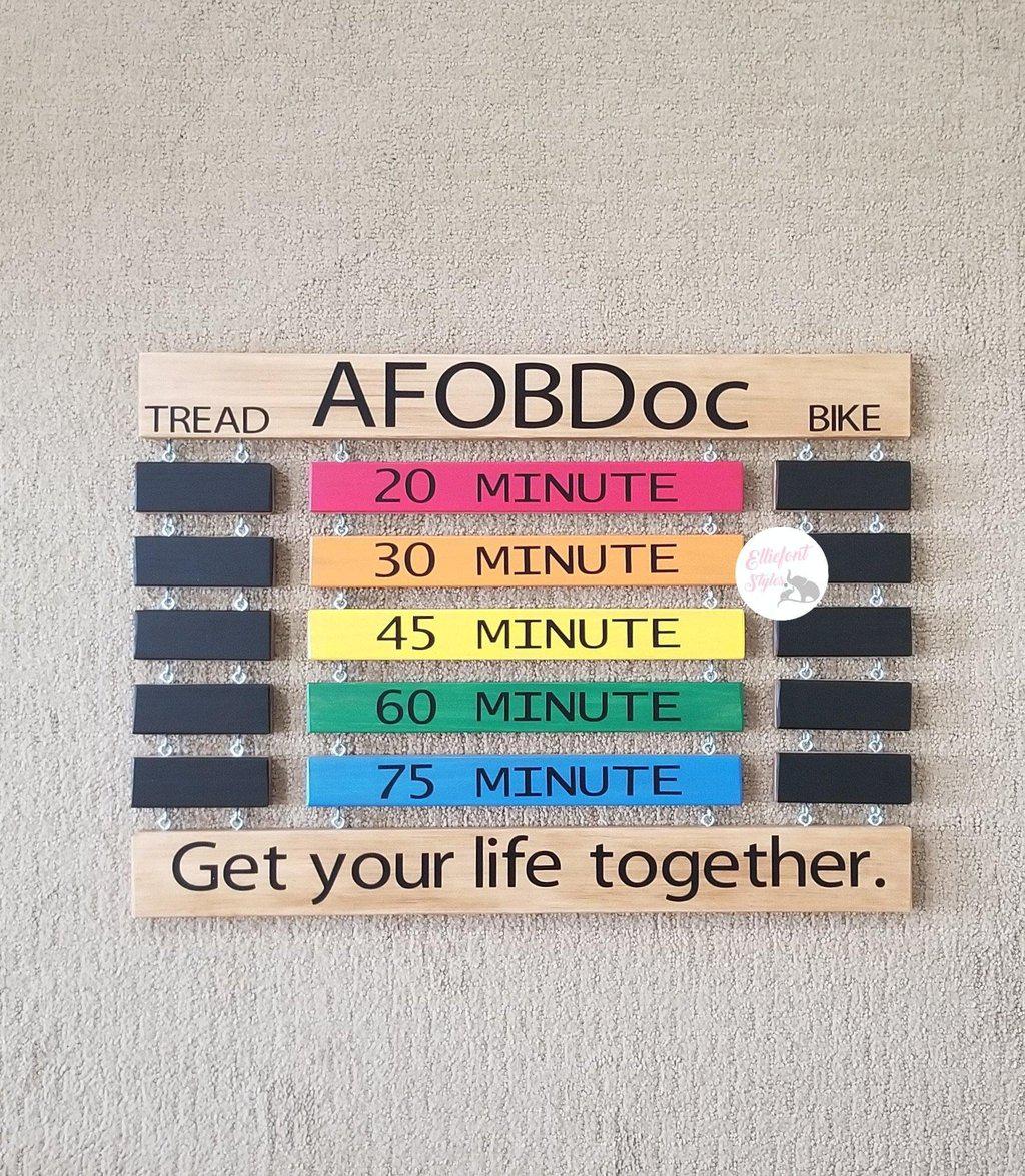 Handmade cycling achievement display board for personalized fitness tracking