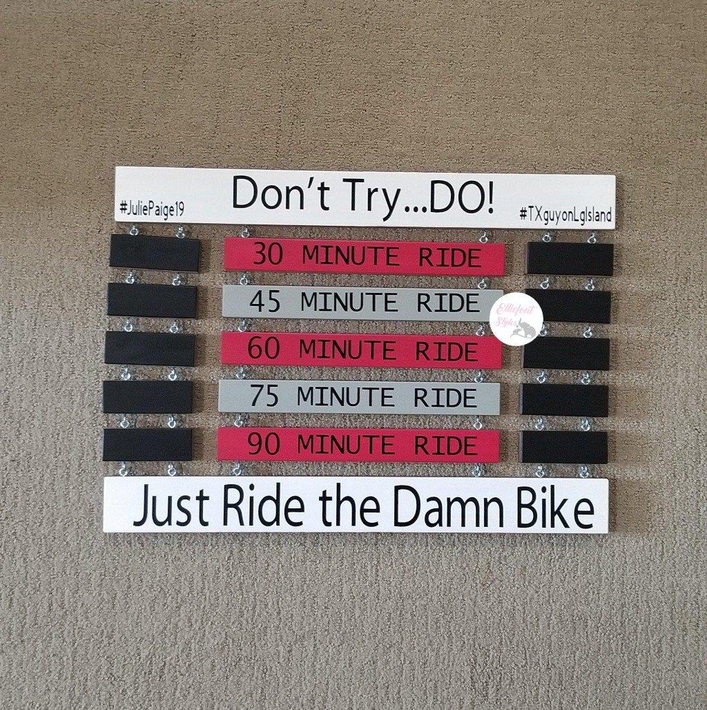 Home gym motivation board for cyclists to display personal bests