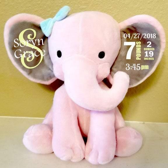 Personalized pink elephant plush displayed as baby girl nursery décor