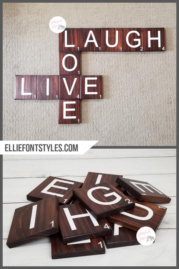 Oversized Scrabble tiles for rustic wall decoration.