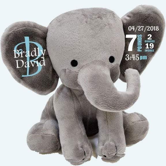 Personalized gray stuffed elephant with baby name and birth stats on ears