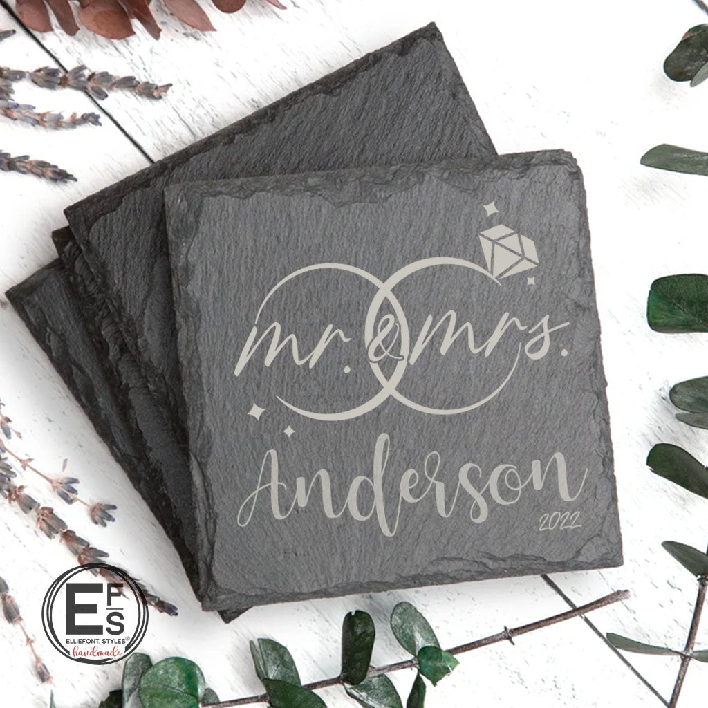 Personalized MR & MRS slate coasters engraved with wedding rings and couple’s last name for wedding gift
