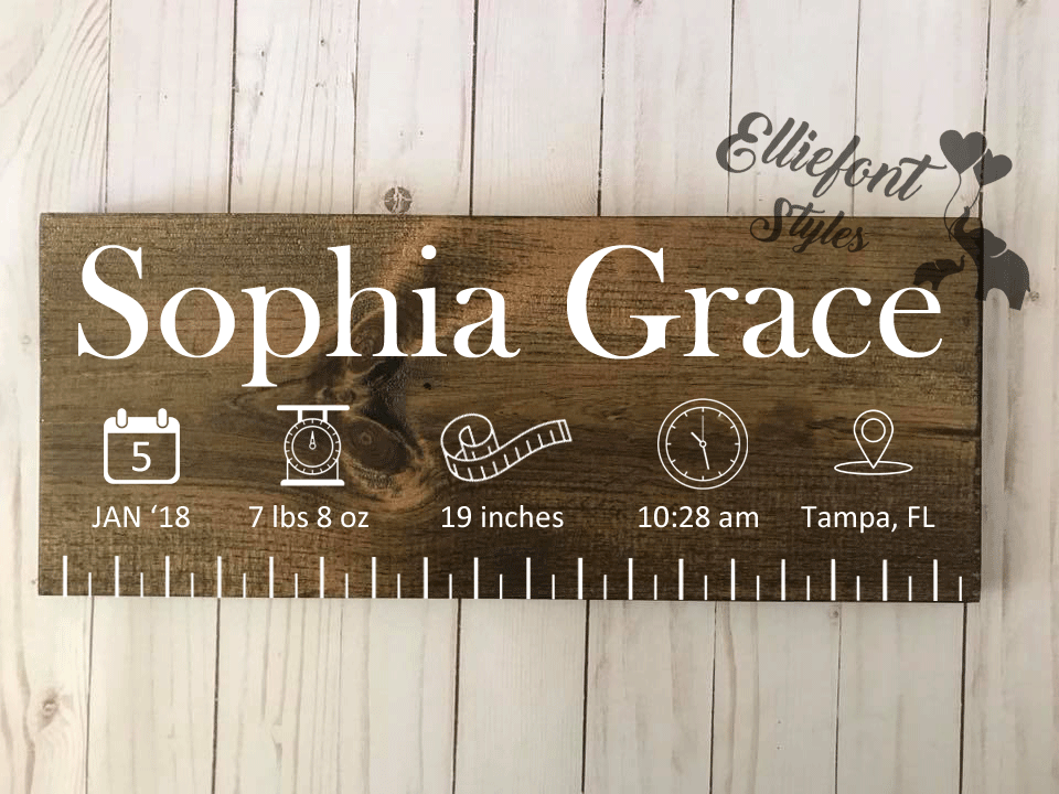Custom engraved wooden sign with newborn birth length and details