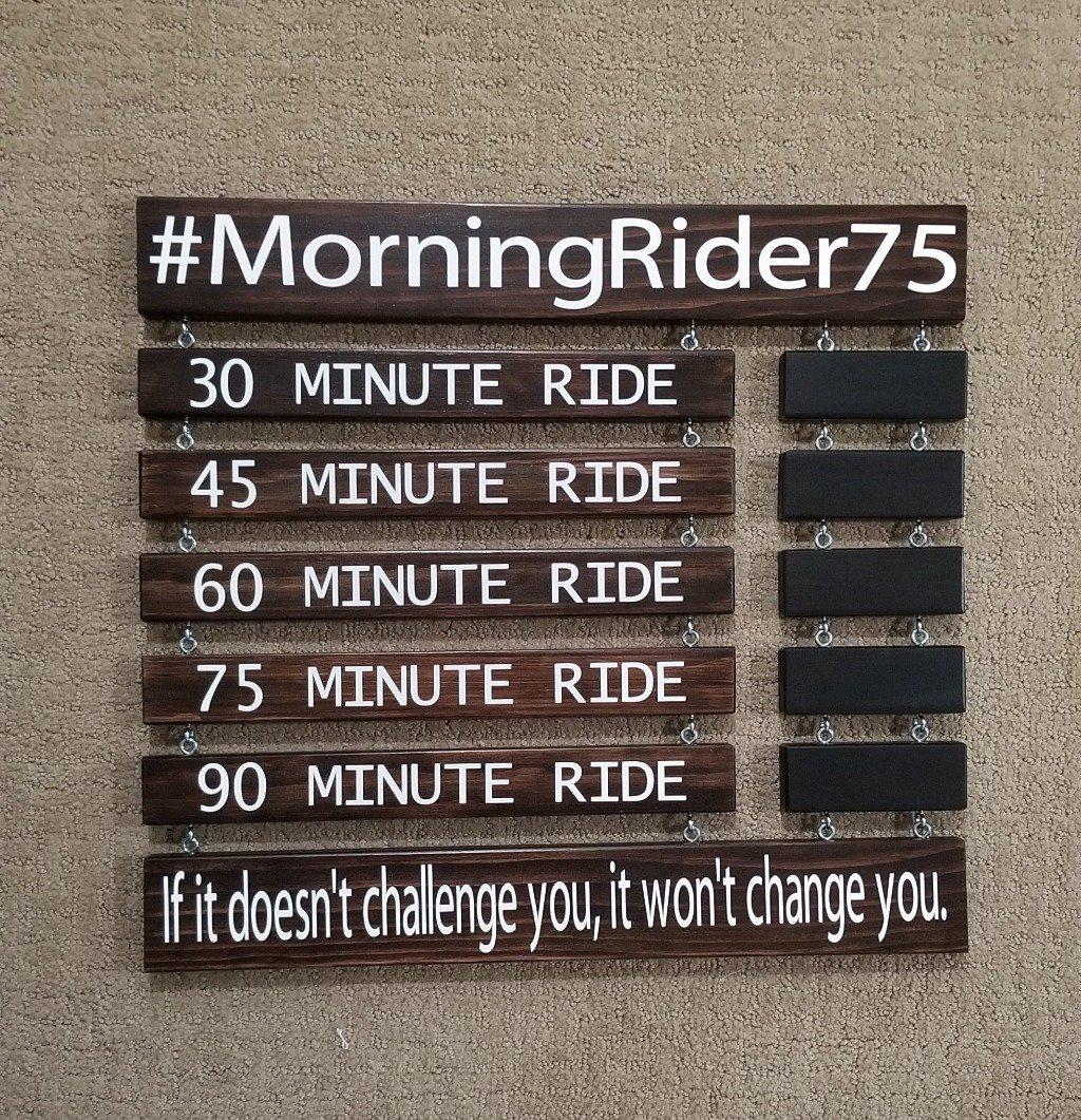 Spin bike PR board for tracking fitness milestones and outputs