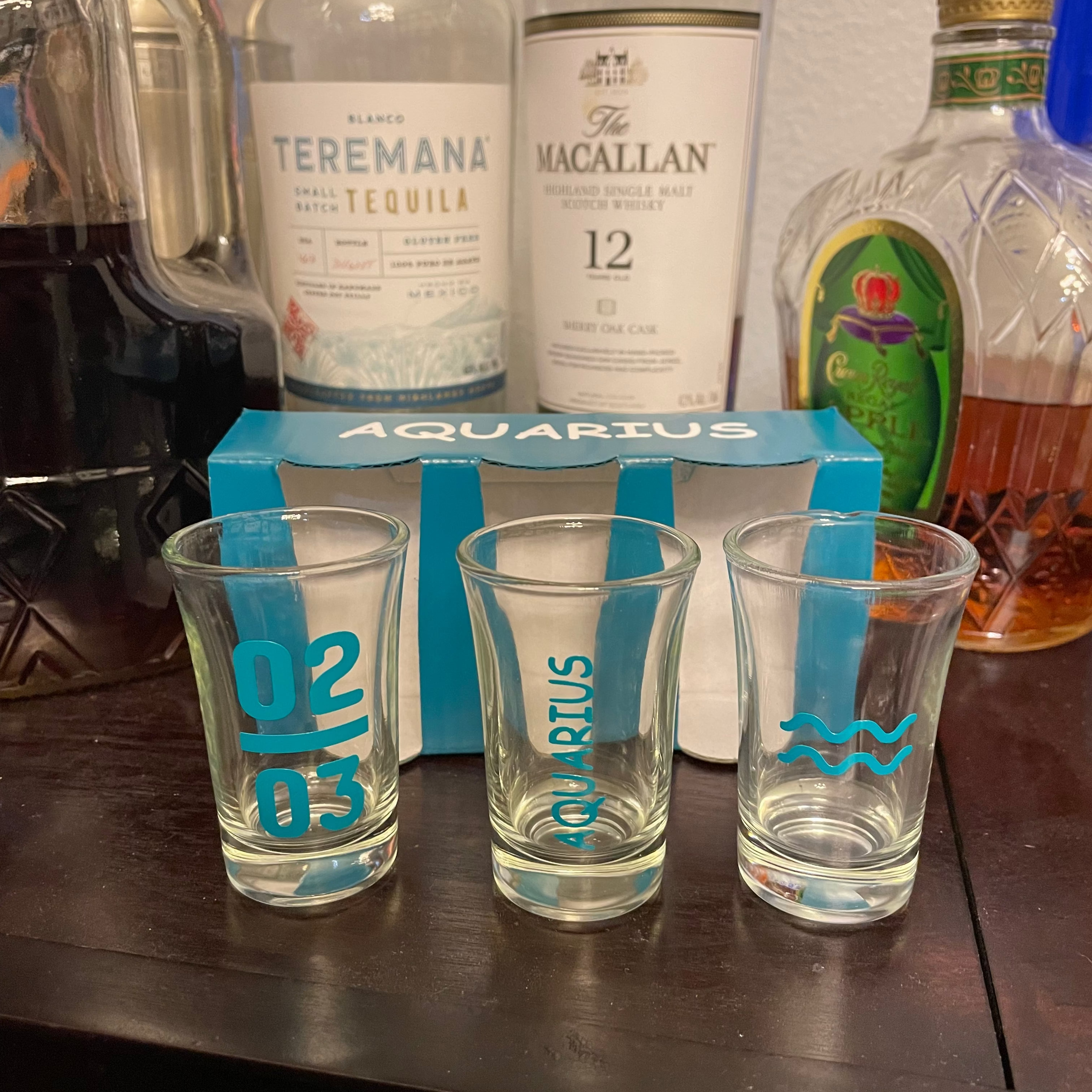 Custom shot glass featuring Aquarius astrology design for birthday gift