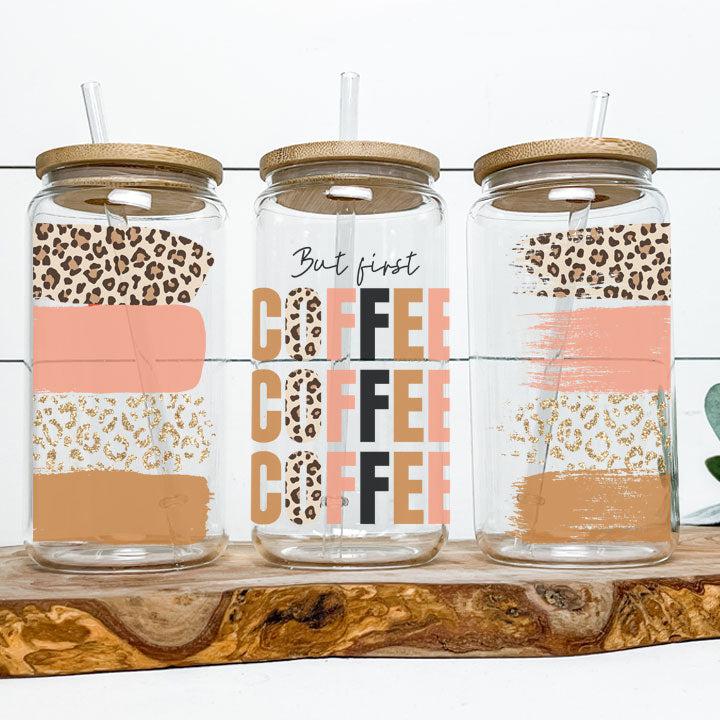 Libby Glass Can Tumbler with “But First Coffee” phrase and neutral brush stroke design, perfect gift for coffee lovers.