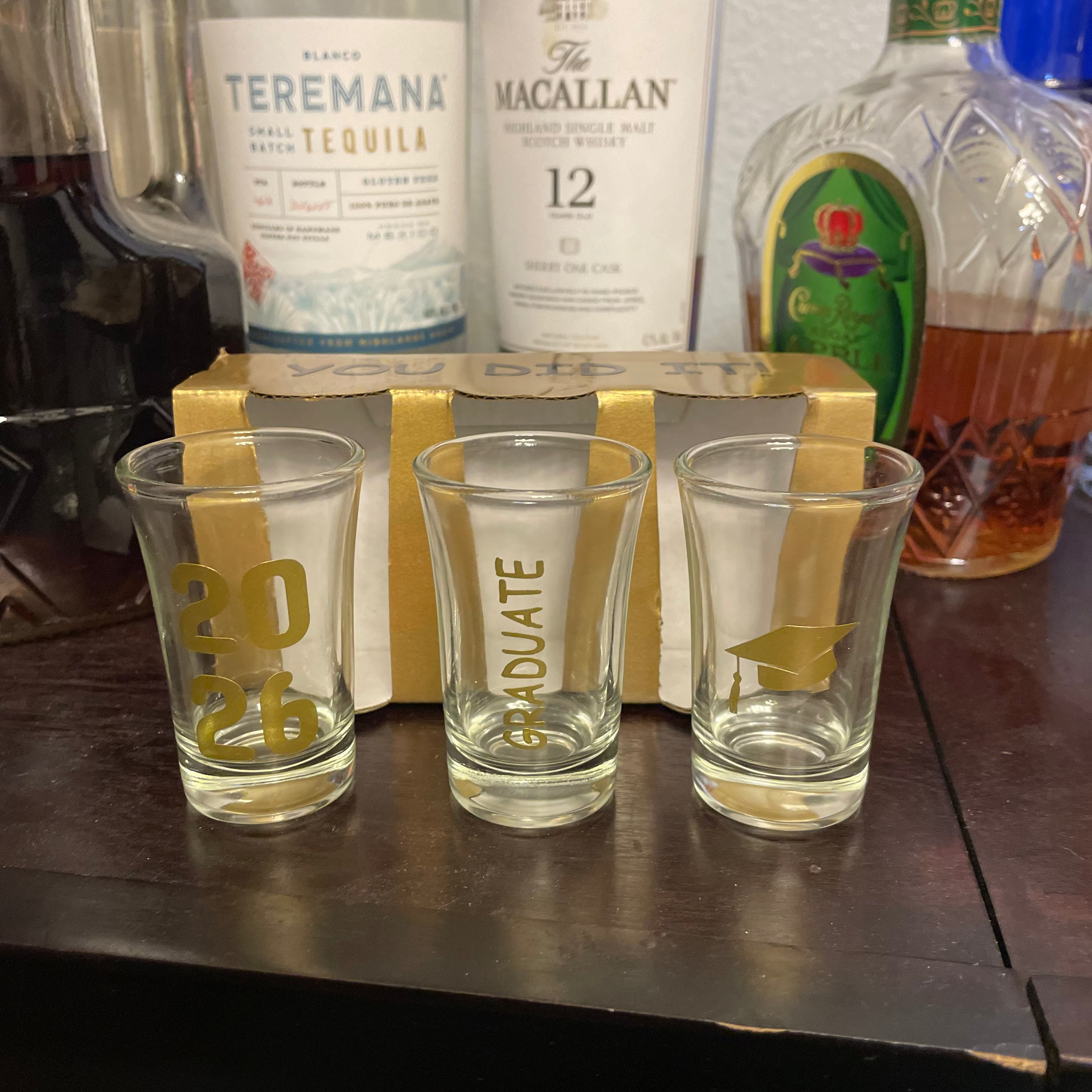 Set of three graduation-themed shot glasses with custom text colors