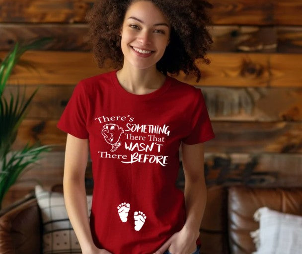 there's something there that wasn't there before pregnancy shirt with feet prints