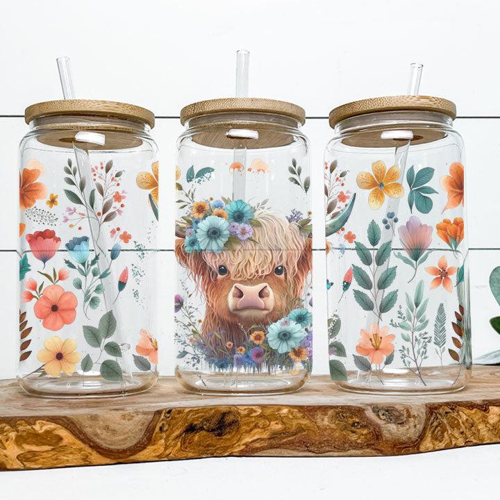 Libby Glass Can Tumbler with baby Highland cow and flower artwork, charming gift for friends.