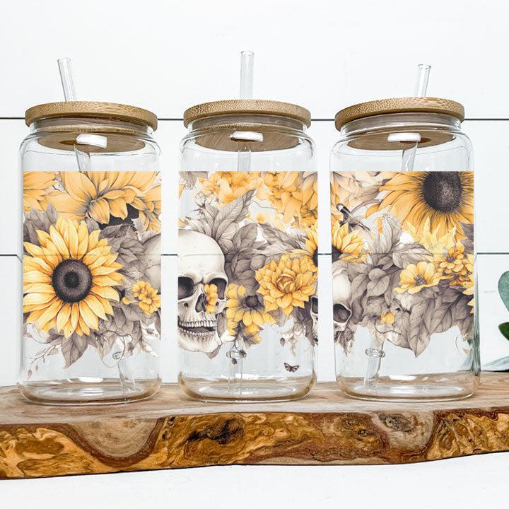 Reusable iced coffee tumbler with gothic sunflower and skull artwork, perfect for goth coffee lovers.