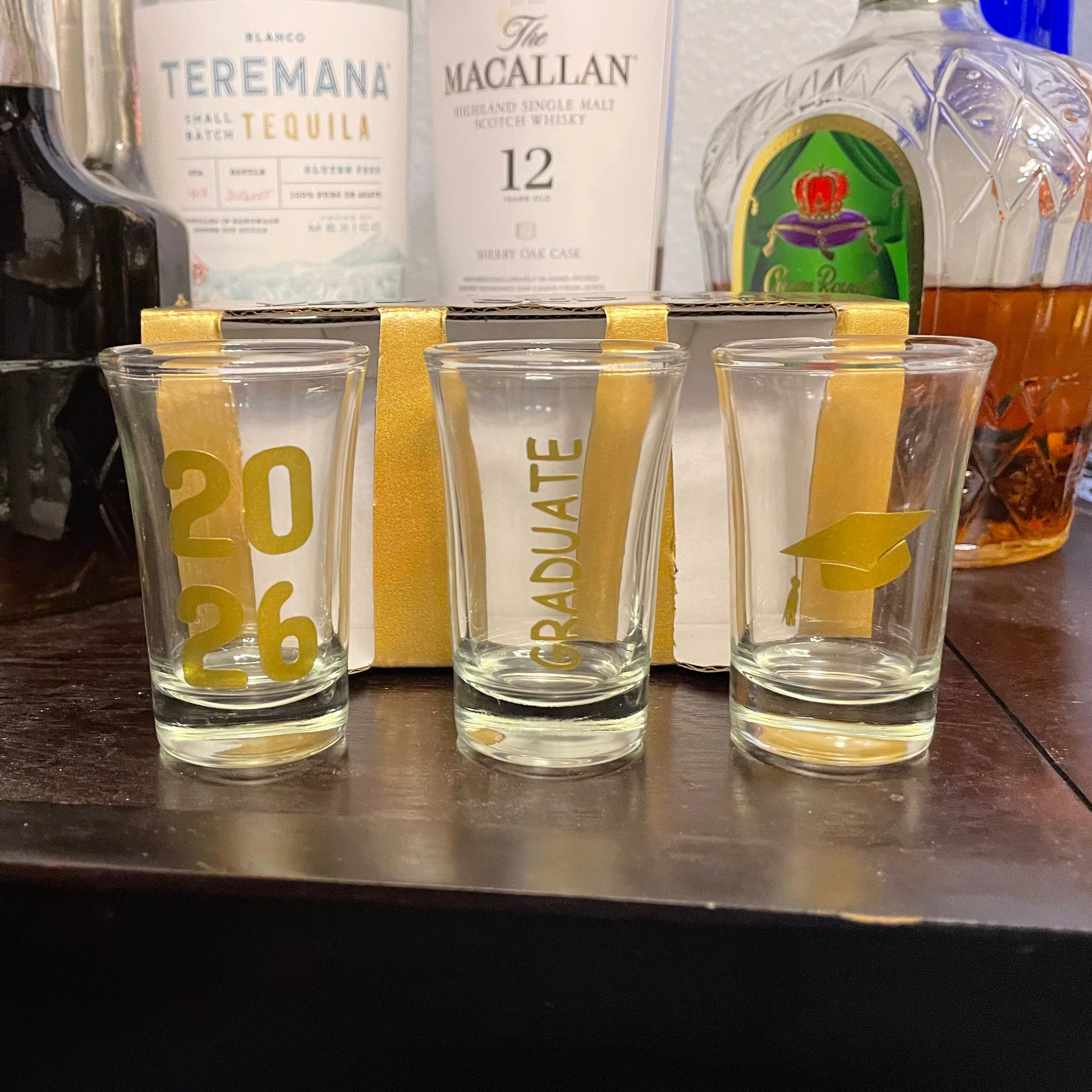 Shot glass featuring the word “Graduate” personalized for graduation celebrations.