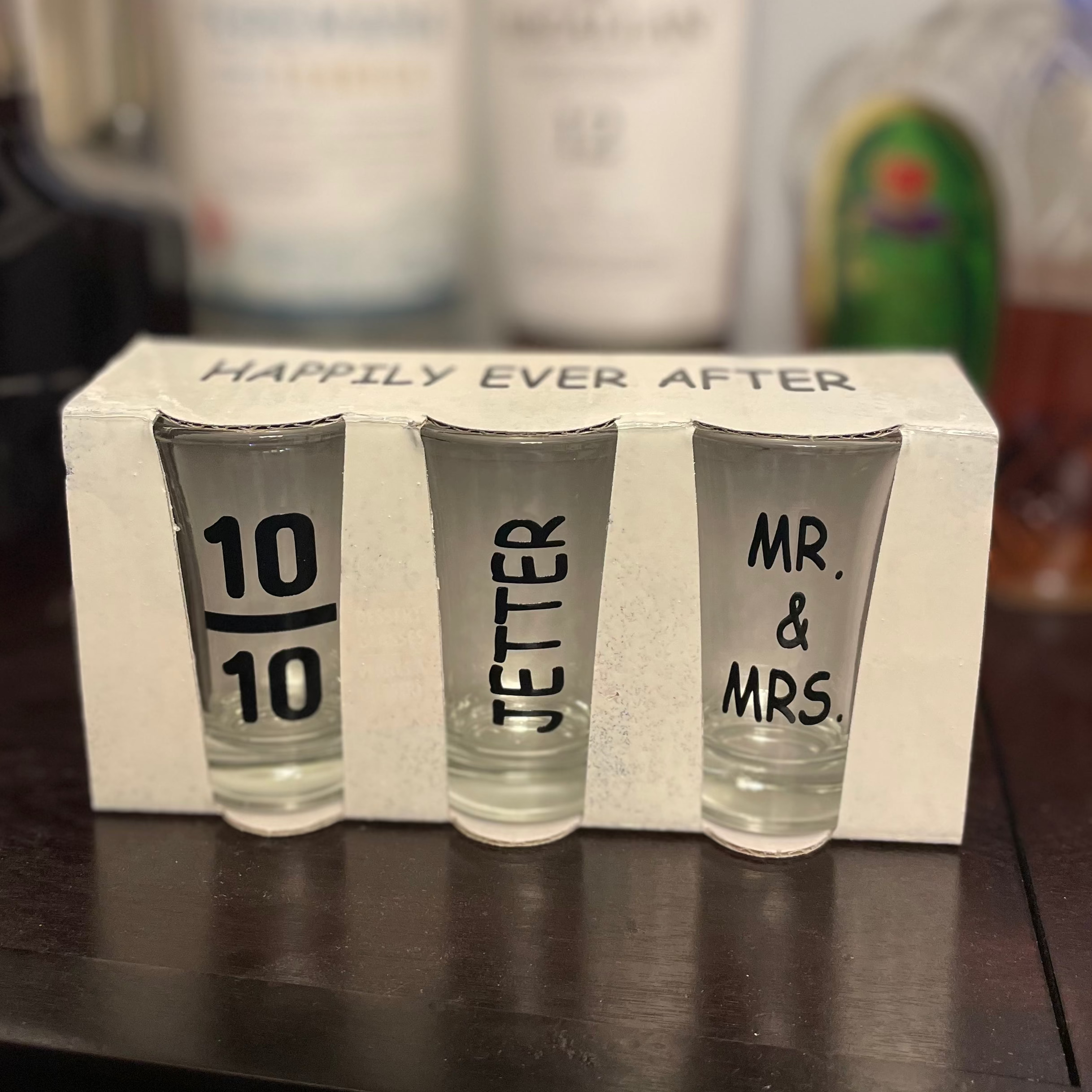 Personalized newlywed shot glass gift with custom date and last name engraving