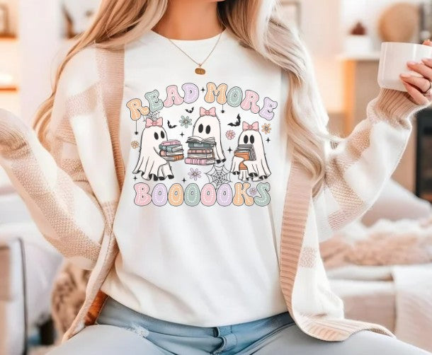 Ghost reading books design on graphic tee for literature teachers