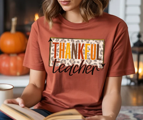 Thankful teacher Thanksgiving shirt for educators with festive design