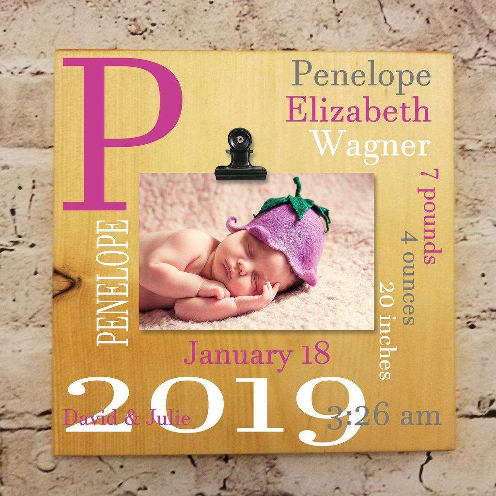 Personalized wooden baby birth stats sign packaged as a thoughtful baby shower gift