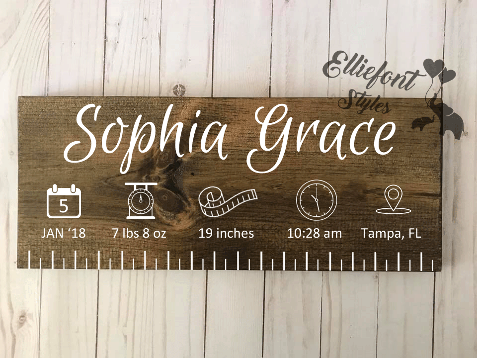 Wooden baby ruler sign wrapped as a thoughtful baby shower gift