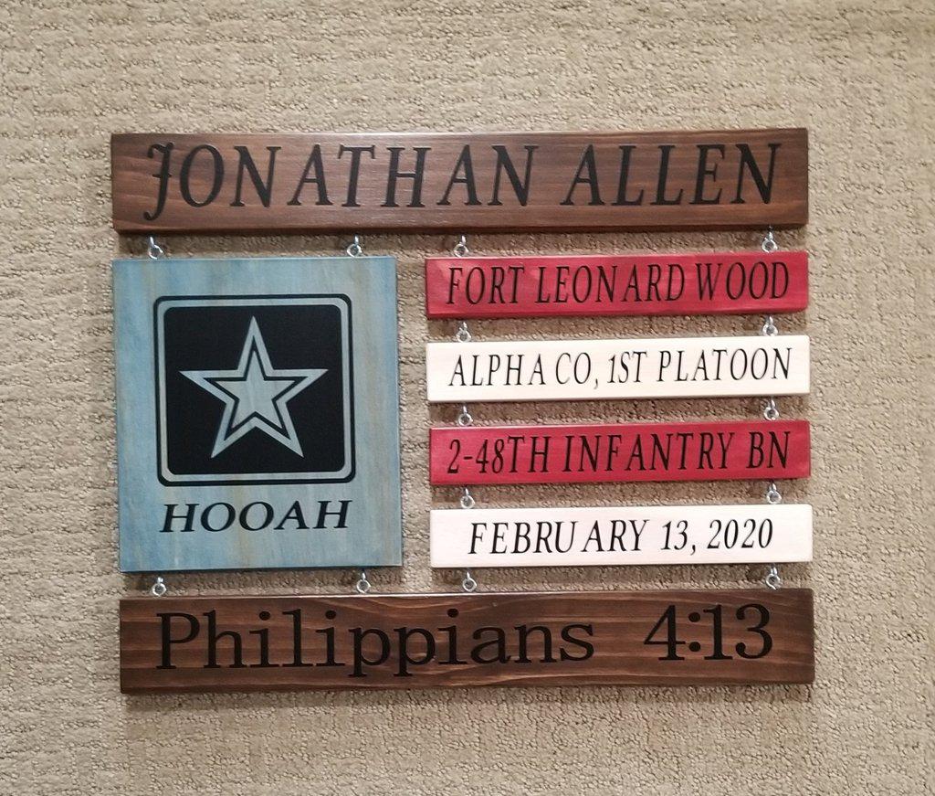 Wooden American flag Army sign engraved with “Be All That You Can Be” motto