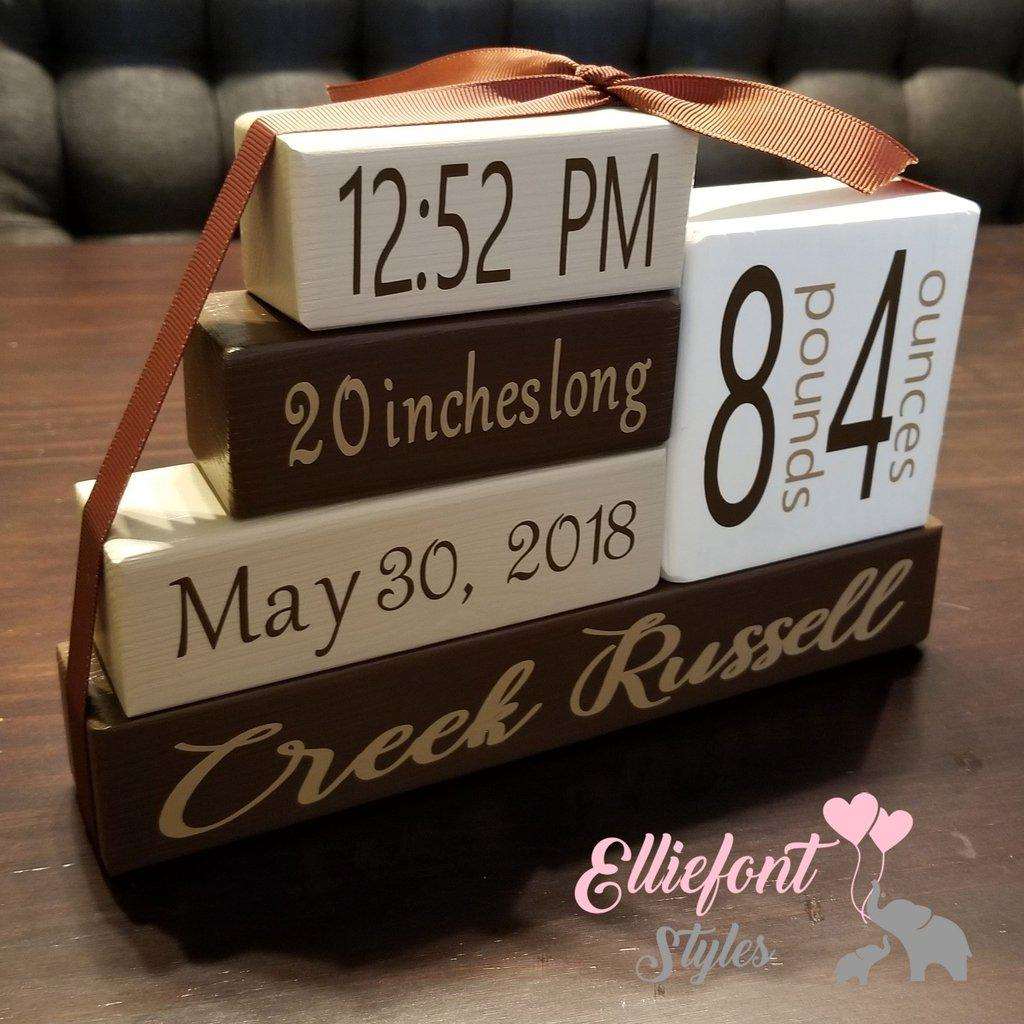 Custom engraved wooden blocks featuring baby’s birth stats