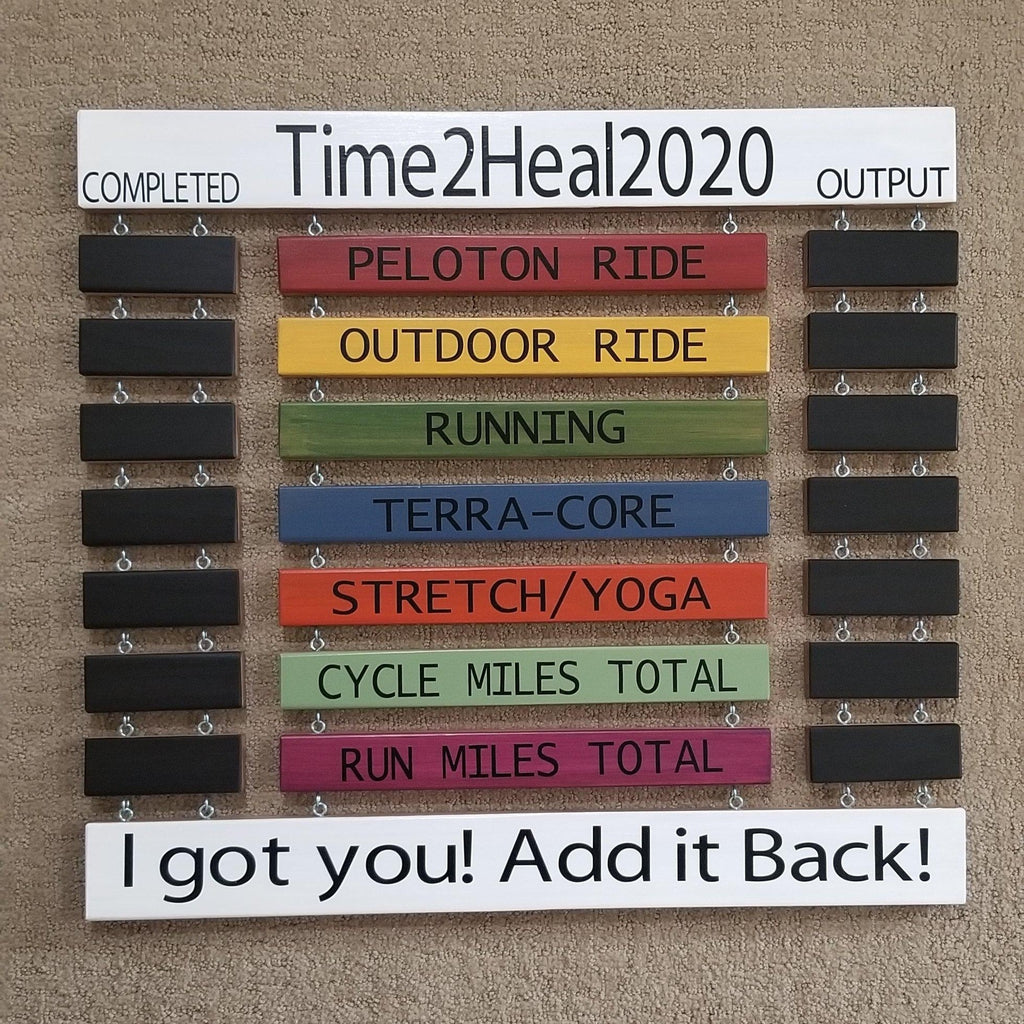 Handmade wooden cycling record sign customized for fitness goals
