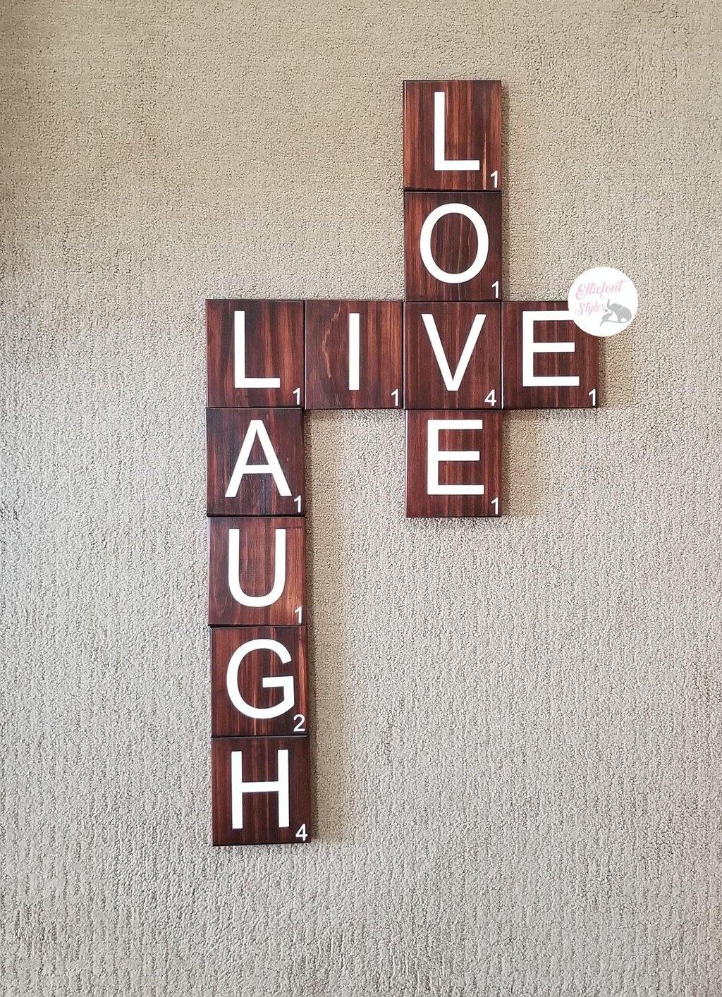 Farmhouse wall art made from large wood Scrabble tiles.