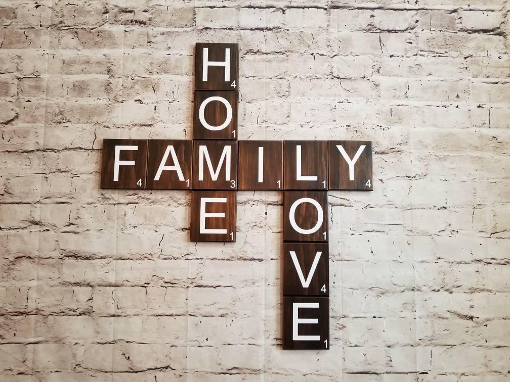 Large wood Scrabble tiles spelling Home Family Love for wall décor.