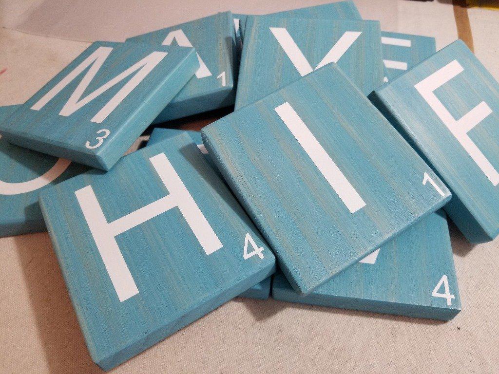 Live Laugh Love Scrabble wall sign made of oak wood tiles.