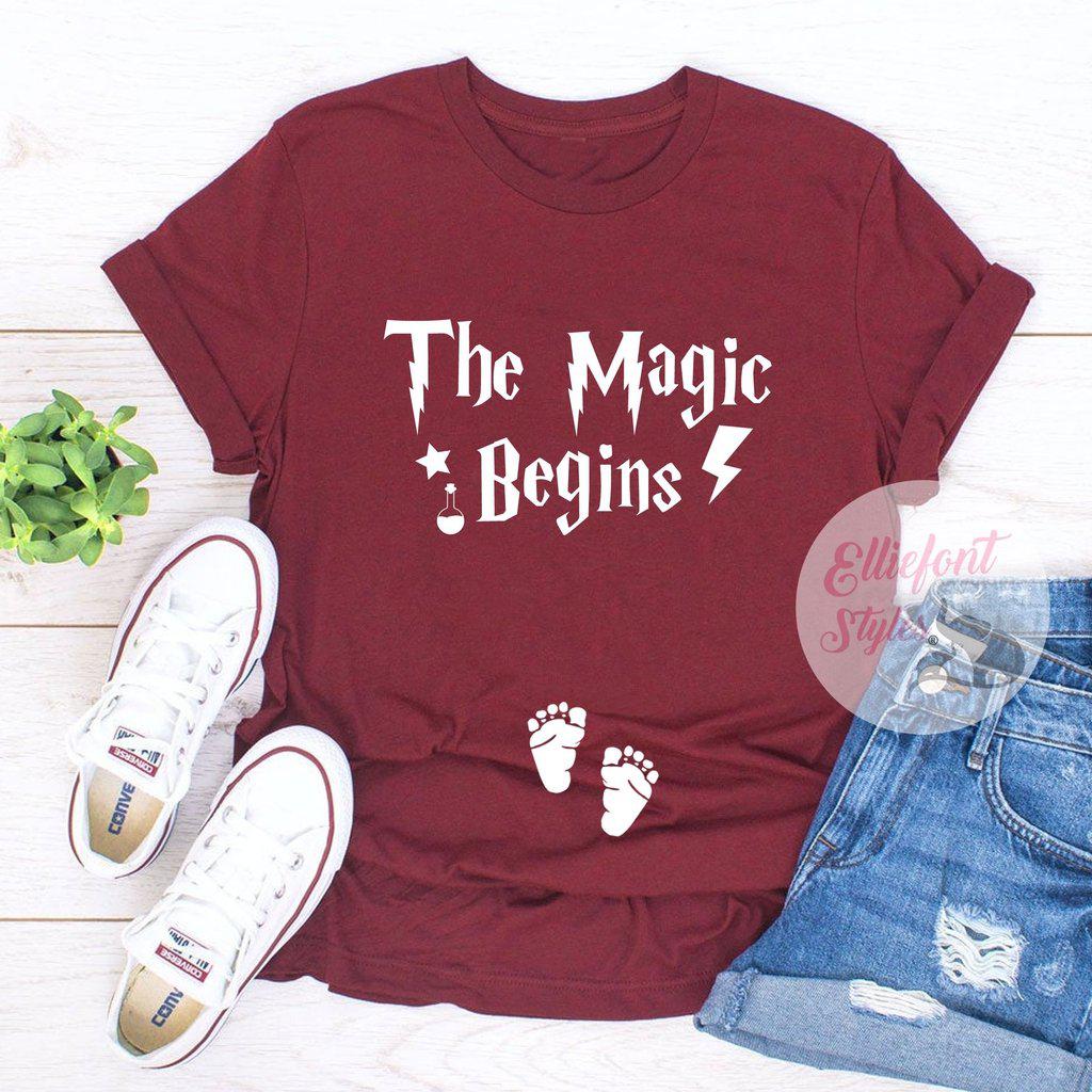 Magical baby reveal maternity shirt with The Magic Begins and baby footprints