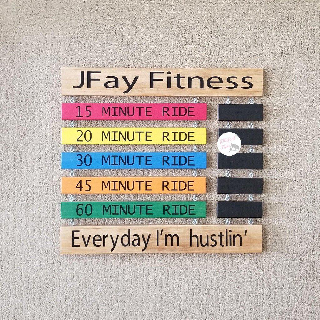 Motivational wall sign for cyclists to display spin bike personal records