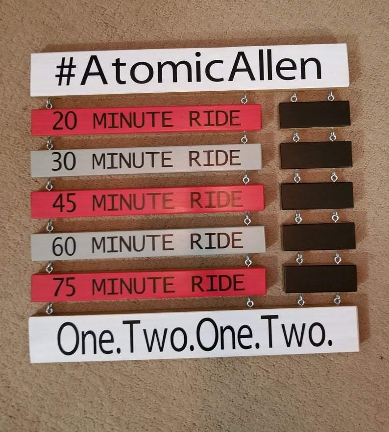 Motivational fitness milestone display sign for spin enthusiasts